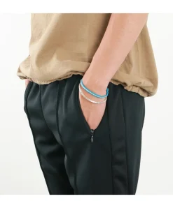 PHADUA / Waxed cord silver single strand concho bracelet